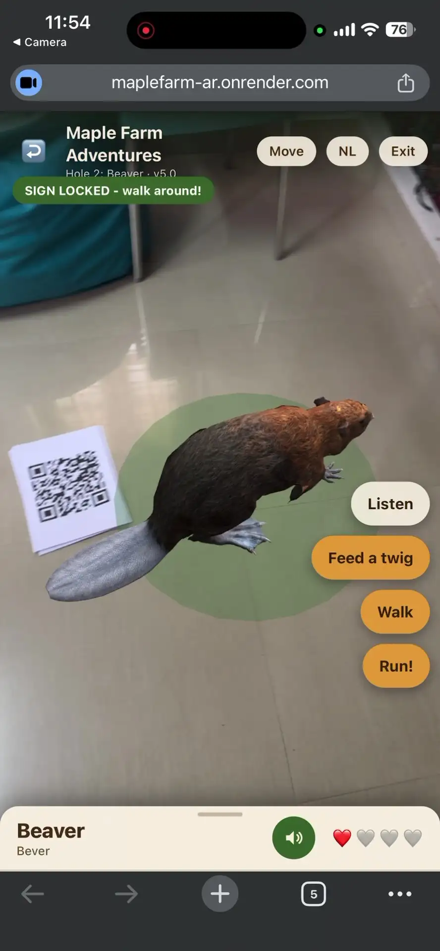Beaver standing beside its printed QR sign in augmented reality, with feed, walk and run buttons on screen