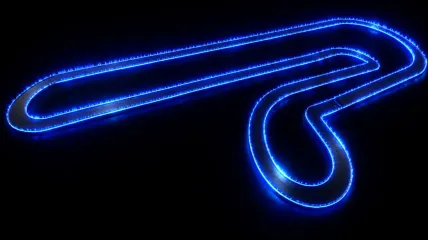 Overhead view of a RideCore circuit drawn as a single glowing blue neon ribbon against black, with long straights and a tight double hairpin.
