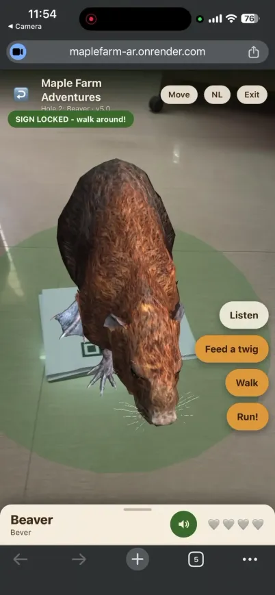 Beaver seen from above in augmented reality, anchored to the printed sign on the floor
